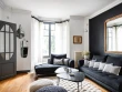 Noir, blanc et gris : un trio gagnant pour cette maison Art déco