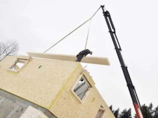 Maisons bois : le système du bois massif tourillonné