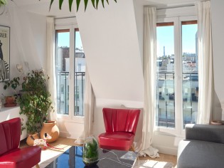Des chambres de bonne transformées en lumineux appartement avec vue