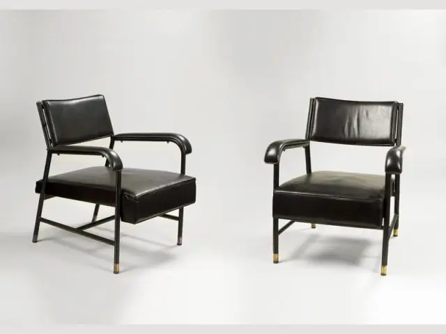 Paire de fauteuils en cuir noir de Jacques Quinet