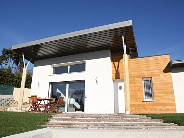 Une terrasse protégée du soleil - Maison Oxygène