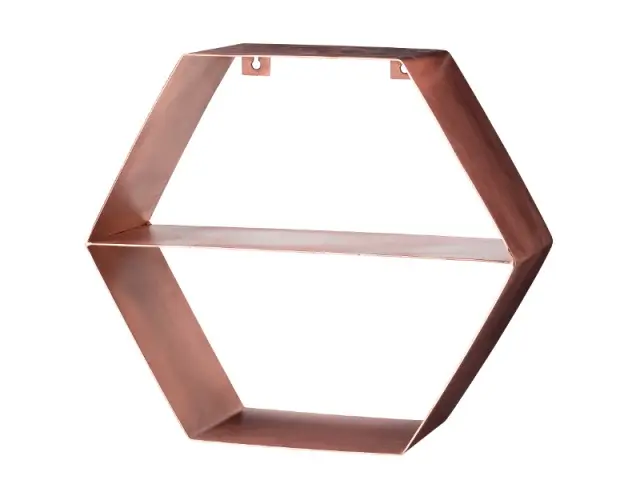 Au mur, une étagère hexagonale coloris cuivre rosé - Tendance cuivre rosé