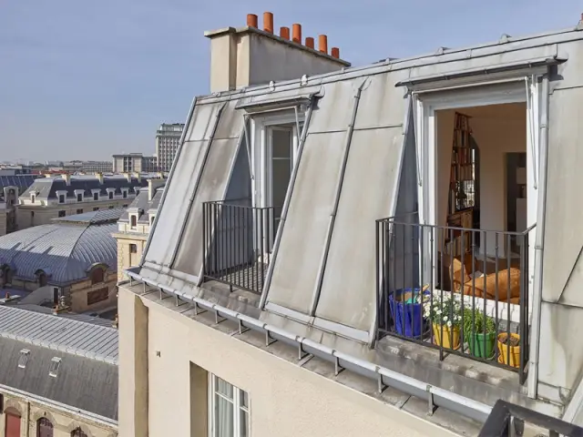 Fiche technique :  - Un appartement structuré et dynamisé par des livres