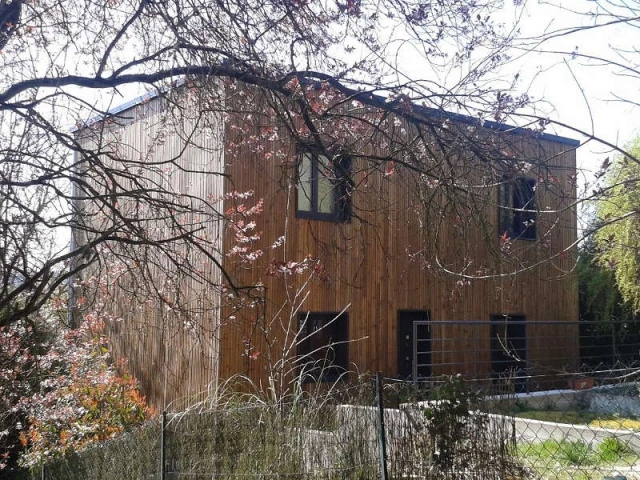 Une maison intégrée au paysage environnant  - Une surélévation ossature bois