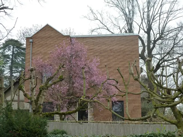 Façade nord/ouest fermée - Une maison transformée grâce à une seconde peau