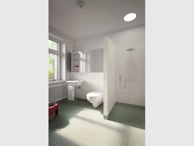 Après : une salle de bains optimisée et baignée de lumière - Maison Renov Active à Bruxelles par Velux