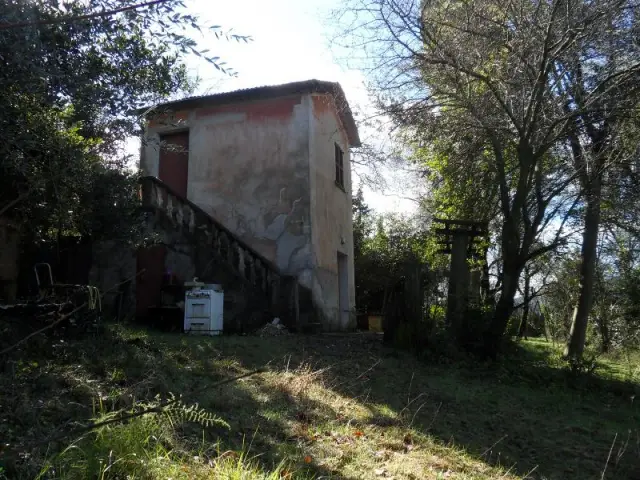 Un escalier extérieur pour se rendre à l'étage